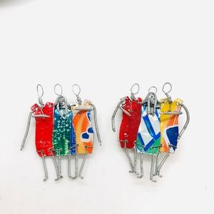 Vintage wire aluminum can people brooches